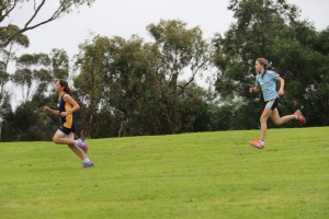 Sarah Marriott and Sienna Darcy competing in the Division Cross Country Running Championships