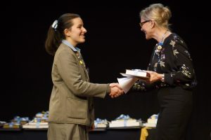 Year 11 Sophie Seng Hpa receiving the Harvard Book Prize from Mrs Lisa Hennessy, Board Member of the Harvard Club