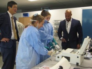 Mr-Frank-Chen-and-staff-instructing-Demi-Markakis-and-Juliet-Grant-in-the-use-of-a-laparoscope_390x295_acf_cropped
